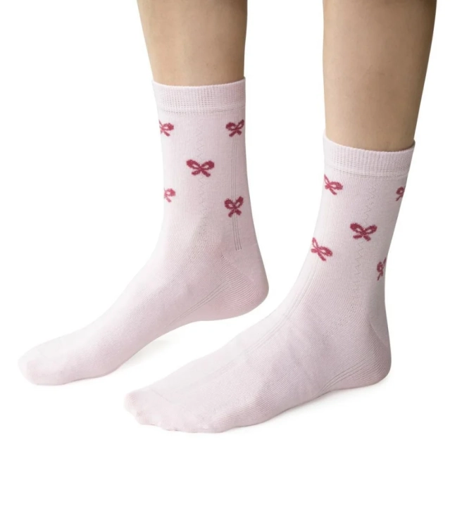 Skarpetki-damskie-z-wzorem-w-kokardki-Steven-099-rozowe.webp